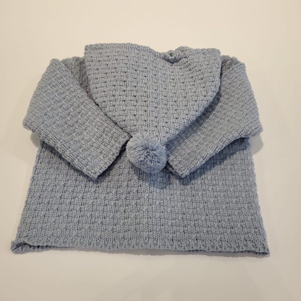 Chaquetón de punto Niño pompones de Paz Rodríguez