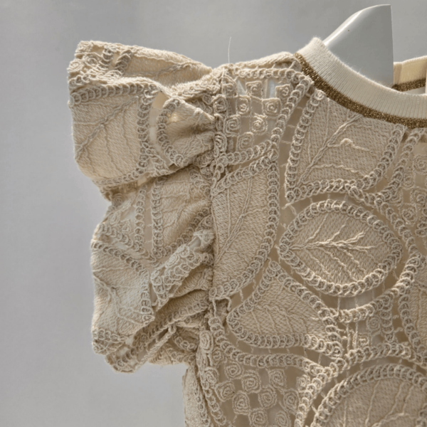Conjunto suéter desmangado y short Noma Fernández verano