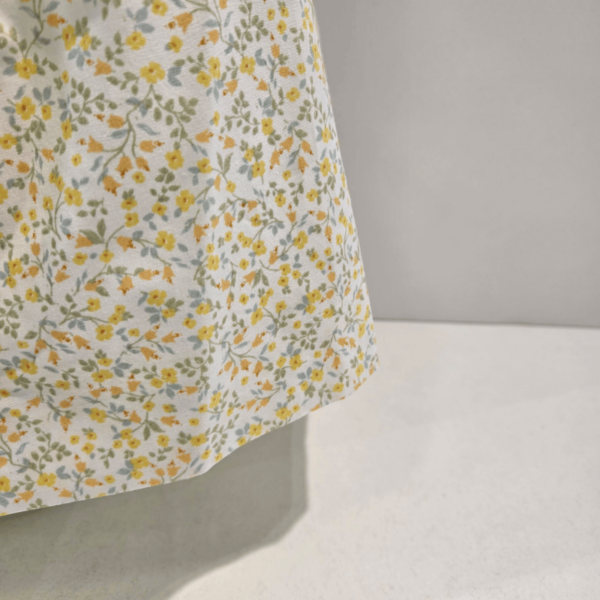 Vestido cuerpo punto y tela florecitas Carmen Taberner verano