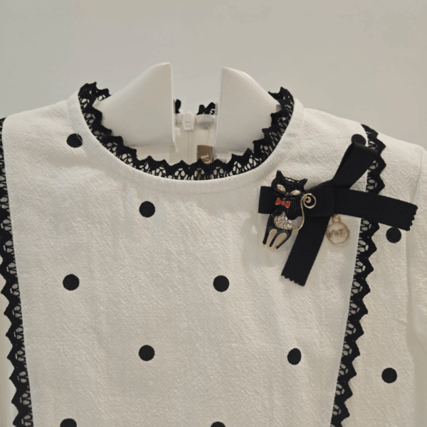 Conjunto falda short y blusa Delia Noma Fernández invierno 26