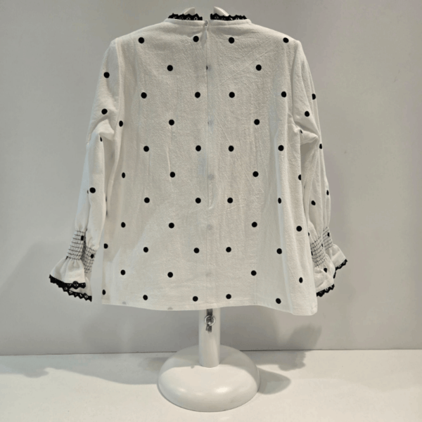 Conjunto falda short y blusa Delia Noma Fernández invierno 26