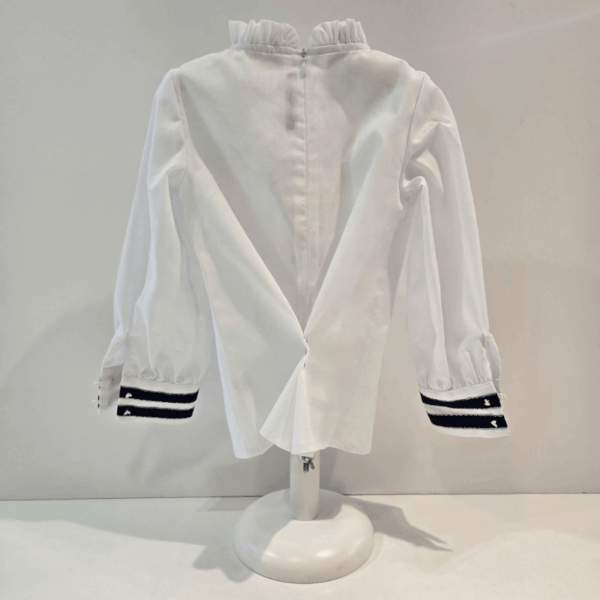 Conjunto camisa falda short tablas Casandra Noma invierno 26