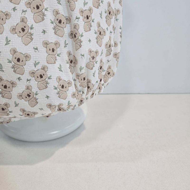 Pelele cuerpo punto camel tejido tela estampada koalas verano