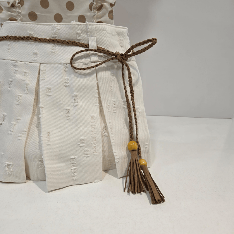 Conjunto blusa con falda short tablas colección Haya verano 26