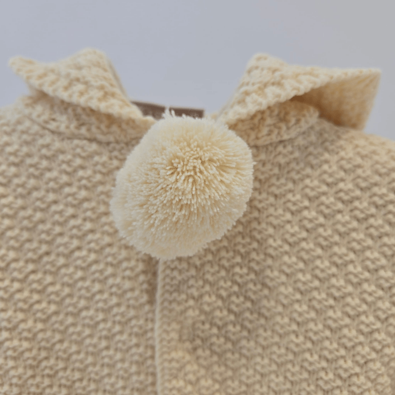 Chaquetón punto capucha pompones Paz Rodríguez invierno