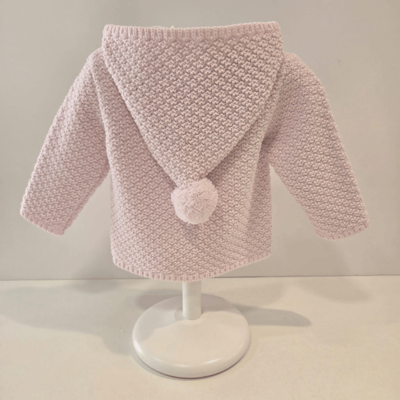 Chaquetón rosa capucha pompones Paz Rodríguez invierno
