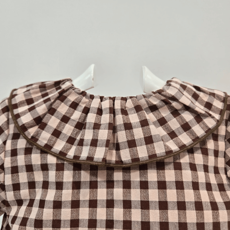 Pelele corto rosa con chocolate Pangasa otoño invierno
